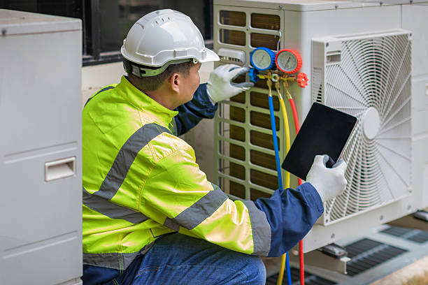 Professional Hvac technician working in Port Jefferson Station, NY